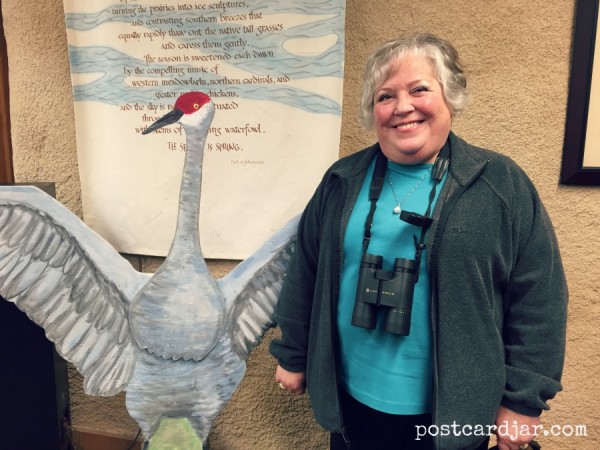 My mom next to a life-sized cut out of a Sandhill Crane. 