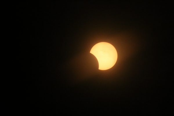Partial solar eclipse photographed by Ronald D. Koch in Crete, Nebraska.