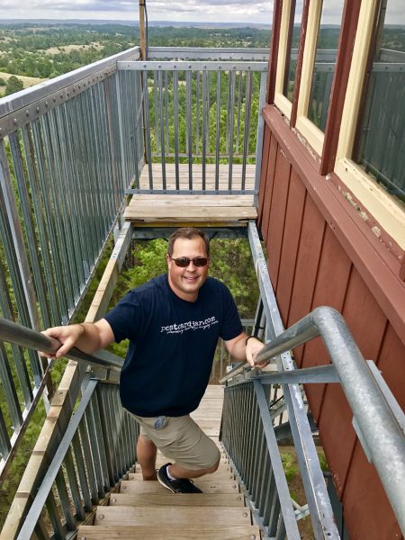 Steve climbs Scott Lookout Tower, Nebraska National Forest