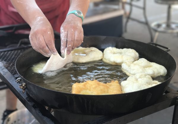 Indian Taco fry bread being cooked in oil at the National Indian Taco Championships in Pawhuska, Oklahoma.