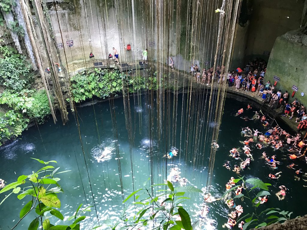 Swimming in the crowded cenote.