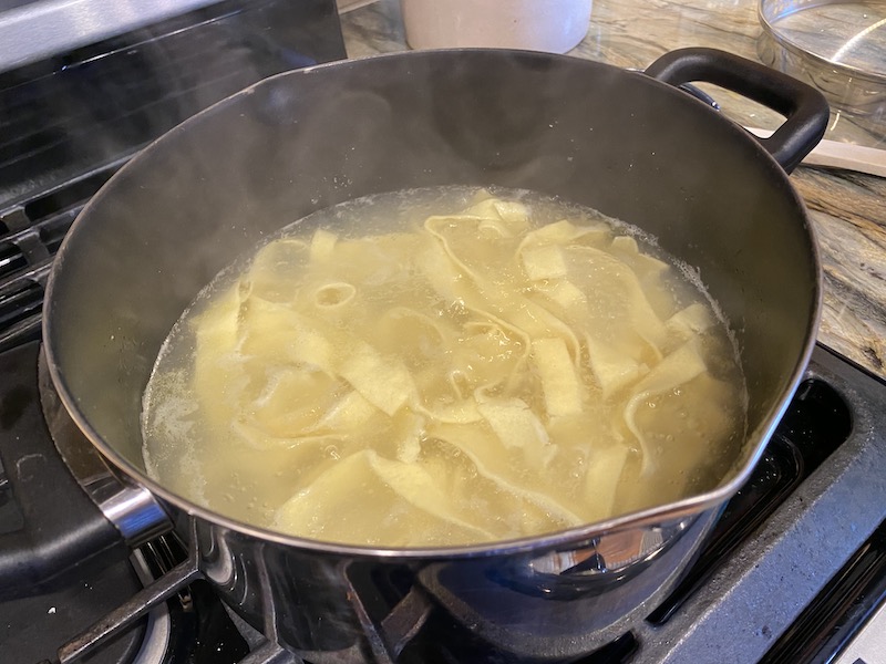 Handmade pasta boiling